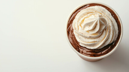 Delicious chocolate milkshake with whipped cream topping on white background