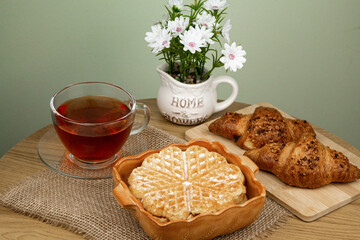 Delicious homemade waffle. Waffle and tea on the table. Homemade breakfast