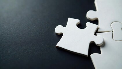 Close-up of unfinished white jigsaw puzzle, single piece absent on black background, missing piece, uncompleted