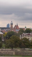Obraz premium City tour in Krakow with river views, streets and historic scenery.