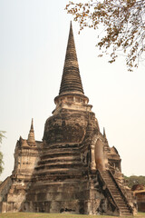 Fototapeta premium View onto one of the stupas, pagodas of the Wat Phra Si Sanphet Temple, Ayutthaya Historical Park, Thailand