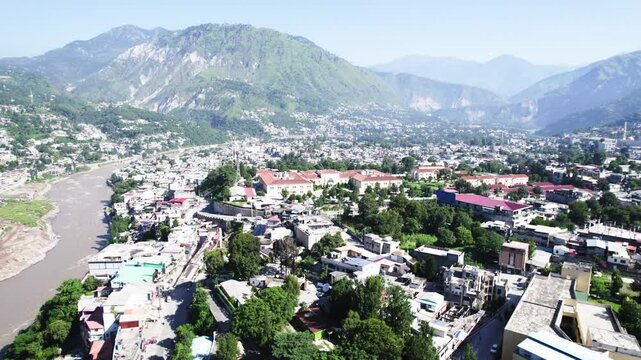 Muzaffarabad city, CMH Hospital, and the Neelum River, surrounded by the Himalayas. Azad Jammu and Kashmir, Pakistan