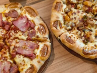 Hot pizza Margaritas on a gray concrete countertop. Cheese in a pizza crust. Tasty vegetable pizza