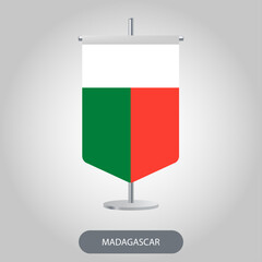 Madagascar vertical table flag on light grey background. Madagascar vertical desk flag isolated on grey background	