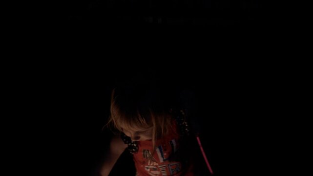 Little Patriot Playing with a Sparkler Firework.