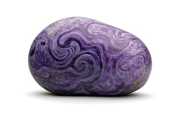 Fototapeta premium Close-up shot of a polished, purple Charoite gemstone on a white studio backdrop