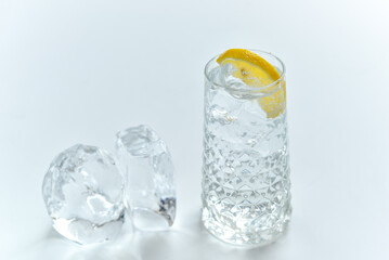 fresh gin tonic cocktail with ice on a white background