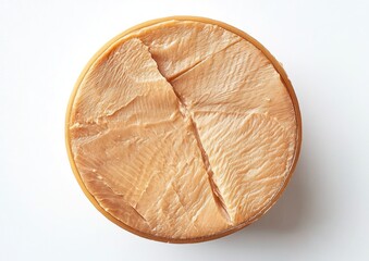 Round container of sliced light beige food product on white background