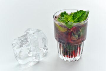 Refreshing cocktail with ice and lemon
