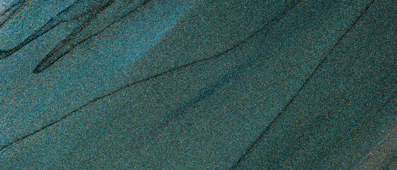 Abstract Background with Iridescent Green-Blue Textures and Shimmering Surface