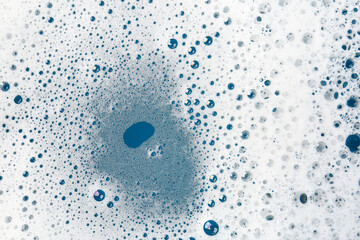 Detergent foam with bubbles as background, top view