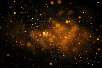 Obraz premium Golden sparkles in dark abstract background with glittering light dots