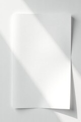 Blank white paper with soft shadows on white background, template, paper, clean