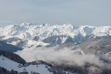 Winter&rsquo;s Embrace: Mist Over the Frozen Valley
