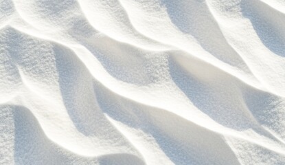 White sand dunes texture.  Detailed close-up view of rippled white sand formations