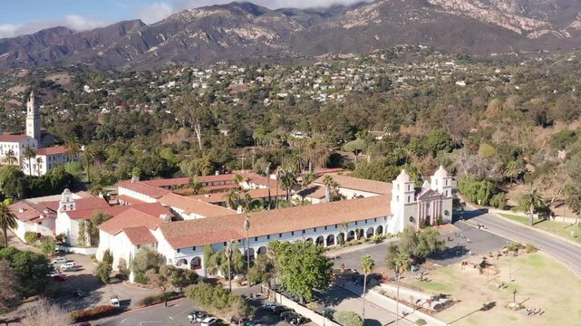 Aerial descending and panning shot of the 19th century Spanish Mission in Santa Barbara, California. 4K