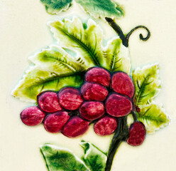 Detail of the traditional tiles from facade of old house. Decorative tiles. Valencian traditional tiles. Floral ornament. 