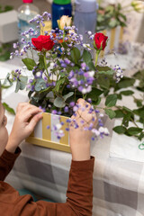 A child makes a handicraft with his own hands for Mother's Day