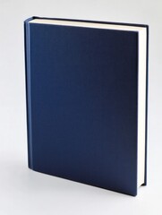 Fototapeta premium Closed Hardcover Book in Navy Blue Standing on a Neutral Background