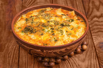 Prepared potato casserole with crust of melted cheese on top