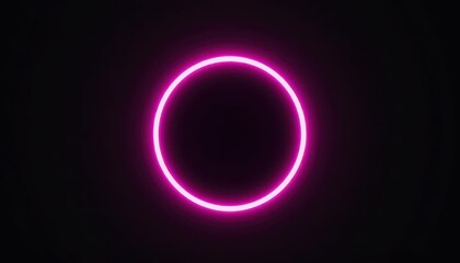 Obraz premium Glowing Pink Neon Circle on Black Background for Modern Designs