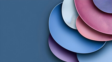 Colorful plates arranged in a curve against a blue background; perfect for food blog or restaurant website header