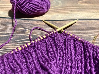 Process of knitting craft handmade hobby clew and needles	
