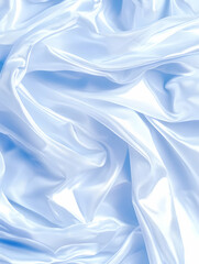 Soft, flowing light blue silk fabric with elegant draping and subtle highlights