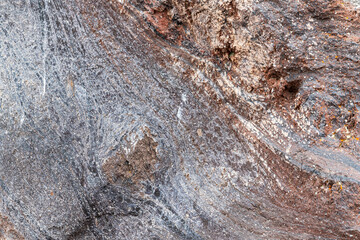 Unique Rock Formations Showcase Natural Patterns in Rugged Terrain