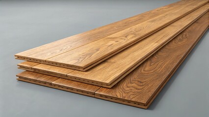 Close-up of oak wood flooring panels with rich textures on gray background, premium material for interior design and home renovation