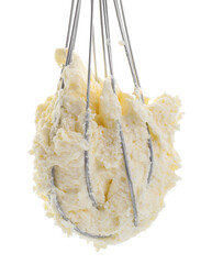 Whisk with delicious cream isolated on white