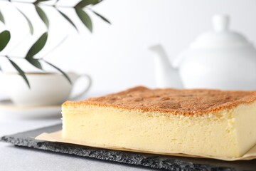 Tasty Japanese Castella sponge cake served on light table, closeup
