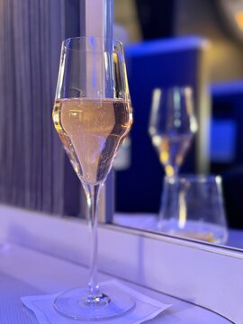 Close-up of a glass of champagne in first class on an aircraft