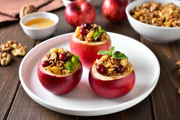 Stuffed apples with granola, cranberries, nuts and honey