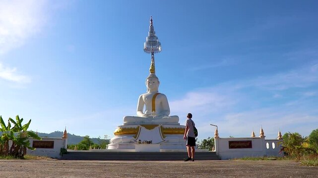 Big white Buddha Wat Phadung Tham Phothi temple Khao Lak.