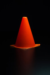 orange cones and chips for football, training tools for the field and the gym for children and...
