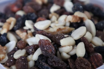 Mixed nuts. Hazelnuts, peanuts, raisins, walnuts