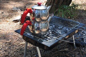 Turkish teapot on the barbecue