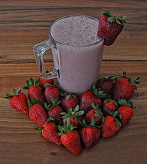 A glass of strawberry milk, healthy strawberry smoothie