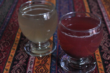 Two glasses of traditional Turkish sherbet on table