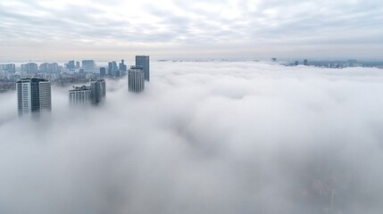 Fototapeta premium Weather report forecast Concept, Aerial View of City Skyline Surrounded by Thick Fog Captured from Drone Perspective