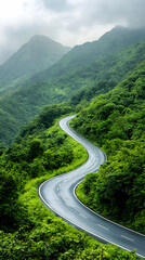 Fototapeta premium Driving Scenic Winding Road Through Lush Green Mountain Landscape on Cloudy Day