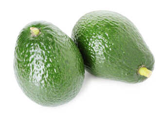Two whole ripe avocados isolated on white