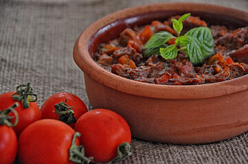 Meat sauteed in the crock with tomatoes