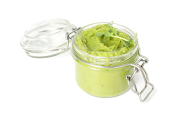 Tasty avocado dip in glass jar isolated on white