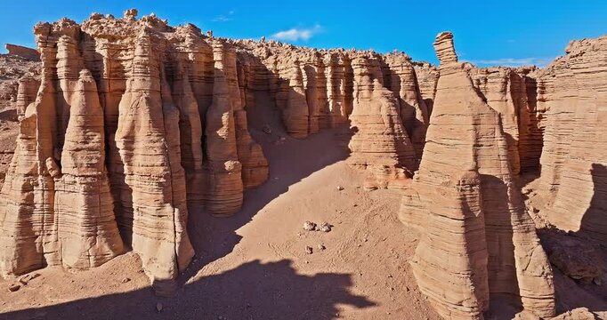 Spectacular yardang landform mountain scenery in the desert. Famous Dahaidao no man's land natural landscape in Xinjiang, China.