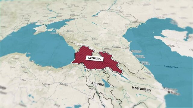 Borders of the state of  Georgia on the map. Country Georgia on the map is highlighted by a polygonal border. From above zooming in with panoramic view