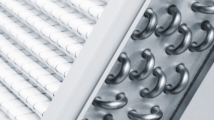 Close up of an industrial metal radiator The radiator is made of metal and has many small tubes
