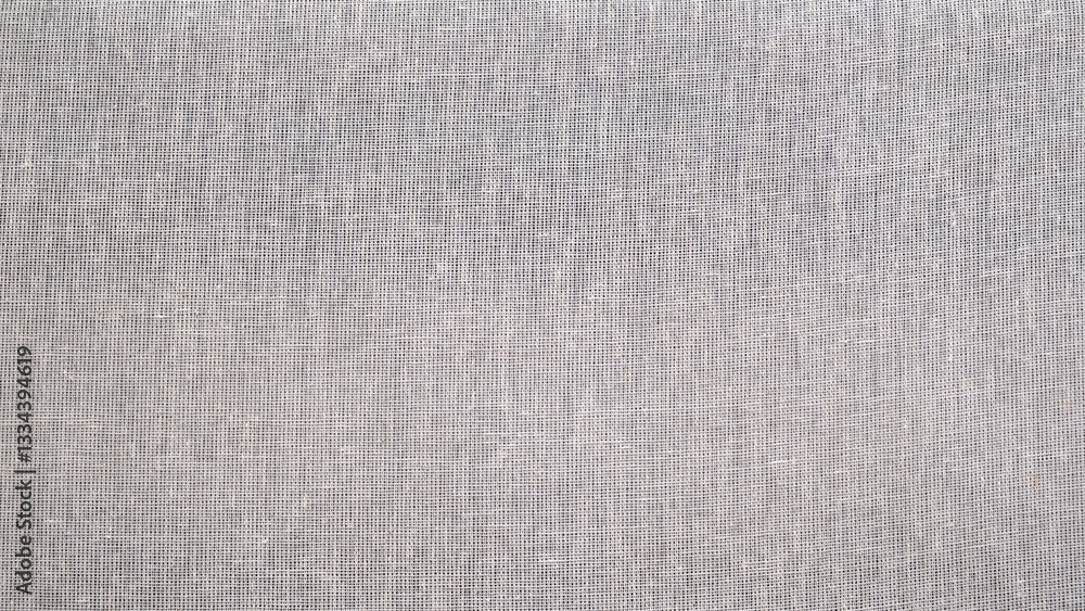 Poster White fabric with a pattern of small squares as a textured background. All the squares are different sizes and are arranged randomly