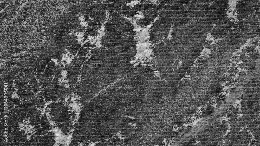 Fototapete Close up of black processed stone surface with lots of texture and pattern. Textured background has rough textured surface.